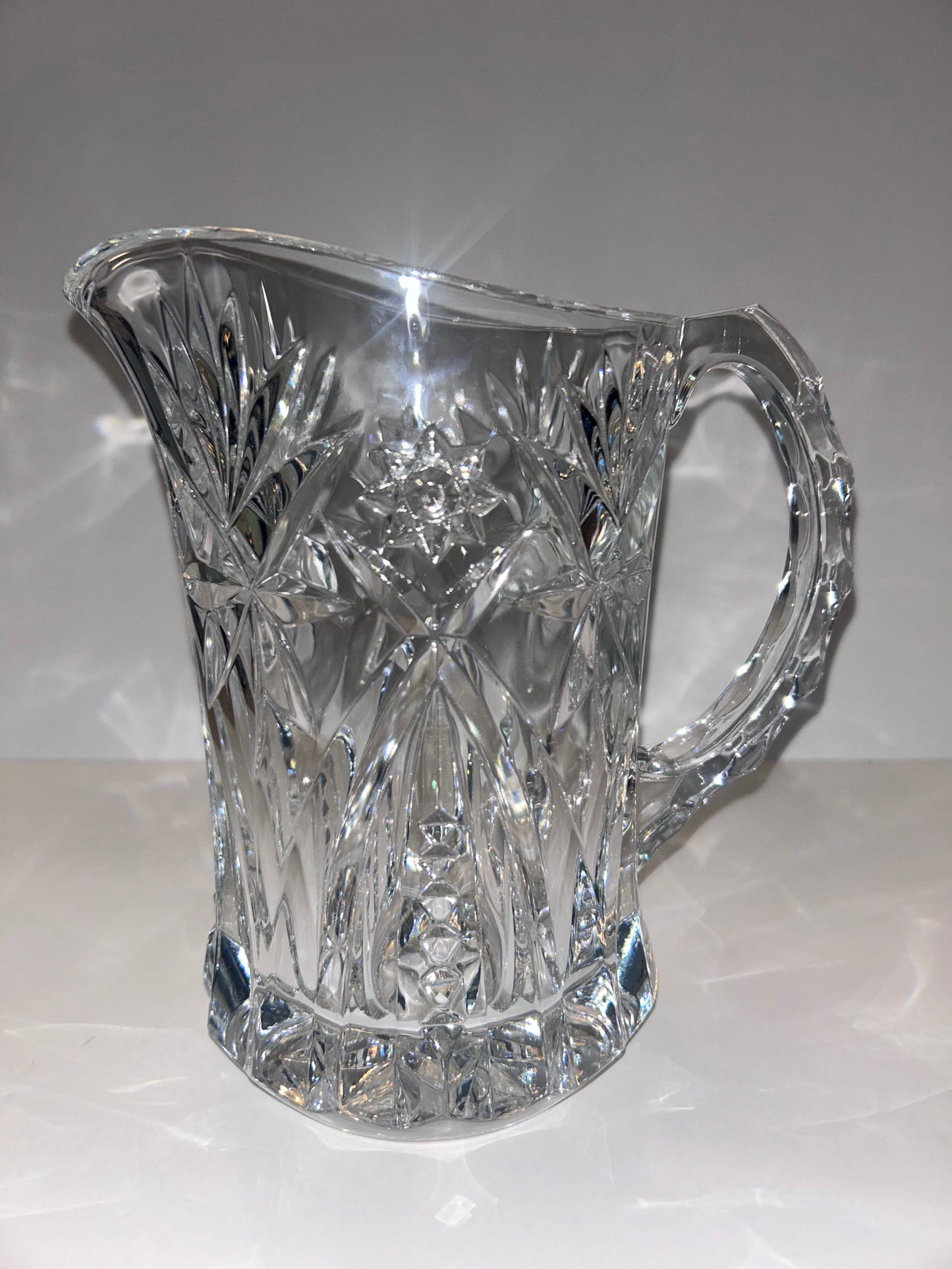 Heavy Cut 24% Lead Crystal Pitcher - Starburst & Pinwheel
Pattern