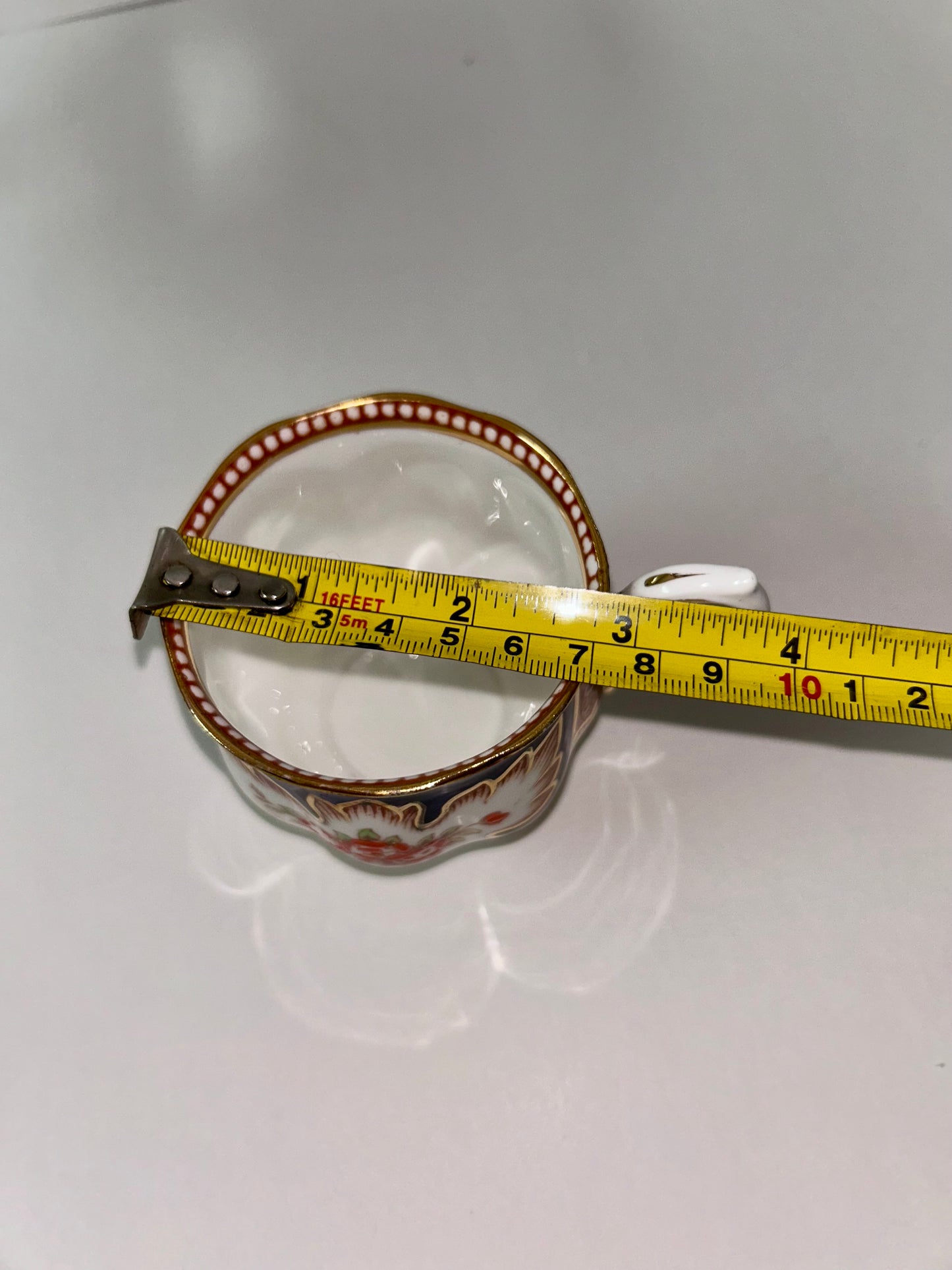 Exquisite Royal Albert "Royalty" Bone China Teacup and Saucer - Cobalt Blue & Orange Floral