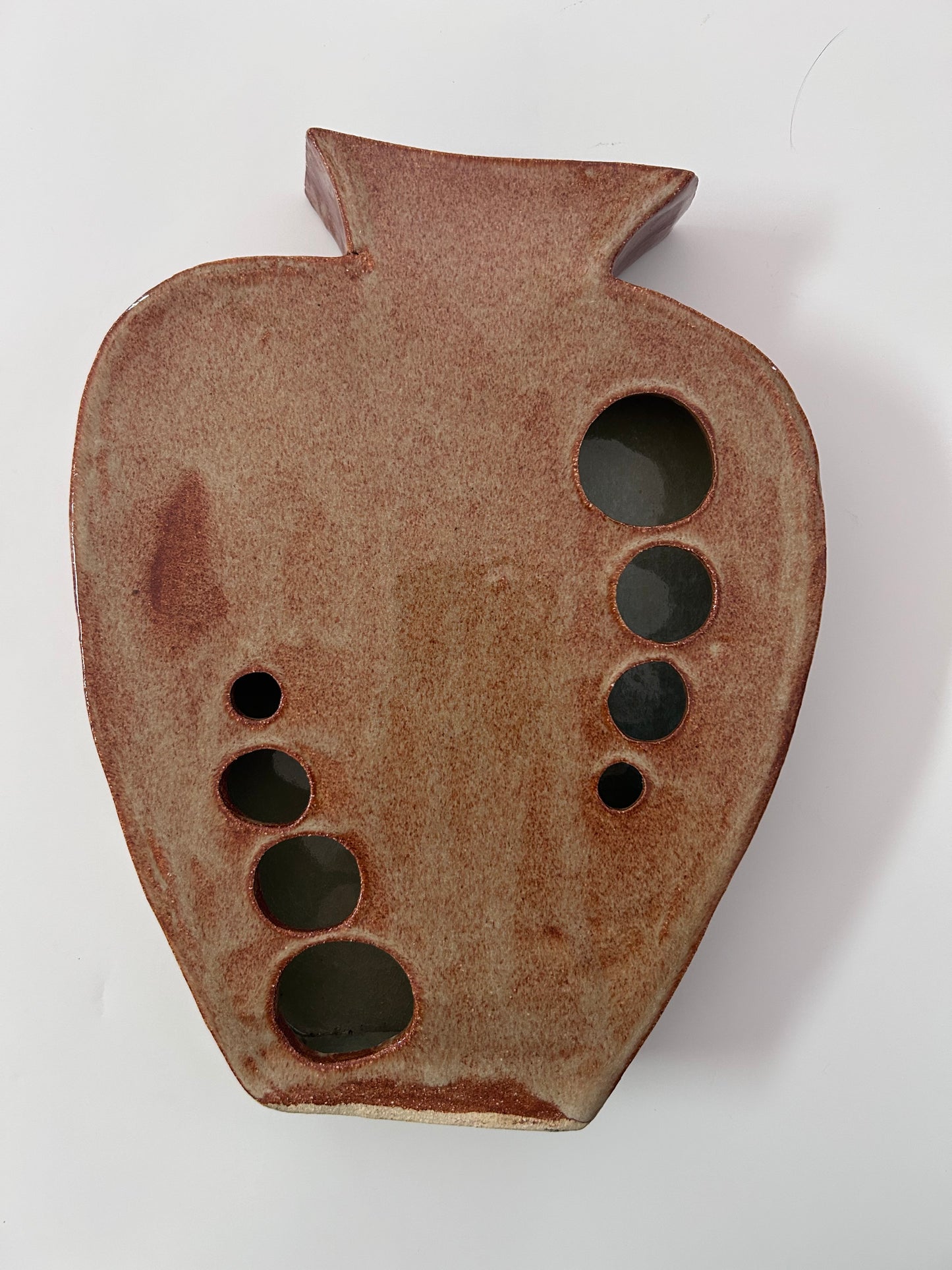 Earthy Ceramic Vase with Circular Cutouts