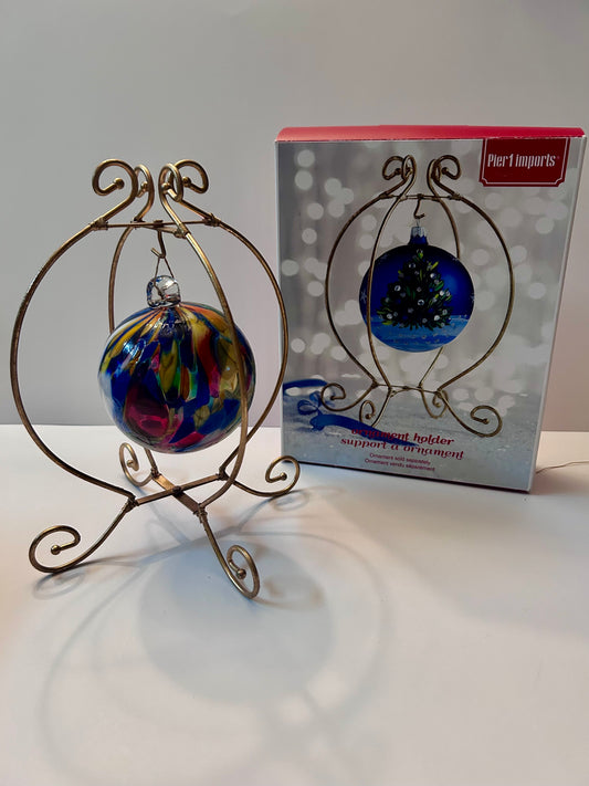 Colorful Hand-Blown Glass Christmas Ornament with Pier 1 Imports Scroll Gold-Tone
Display Stand