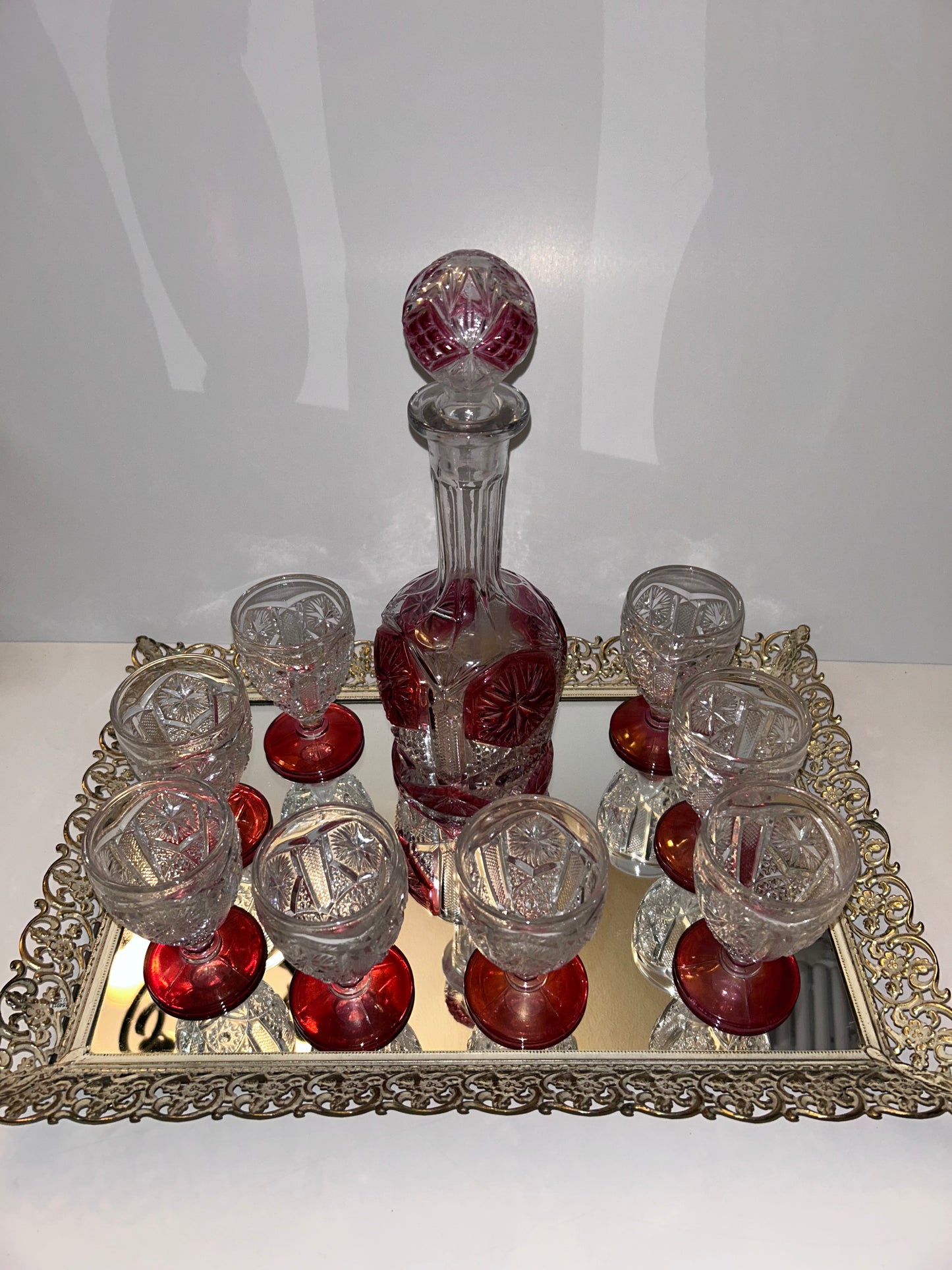 9-Pc Hollywood Regency Ruby Cut-to-Clear Decanter & Ormolu Mirrored Tray Set