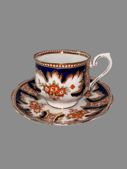 Exquisite Royal Albert "Royalty" Bone China Teacup and Saucer - Cobalt Blue & Orange Floral