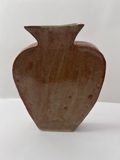 Earthy Ceramic Vase with Circular Cutouts