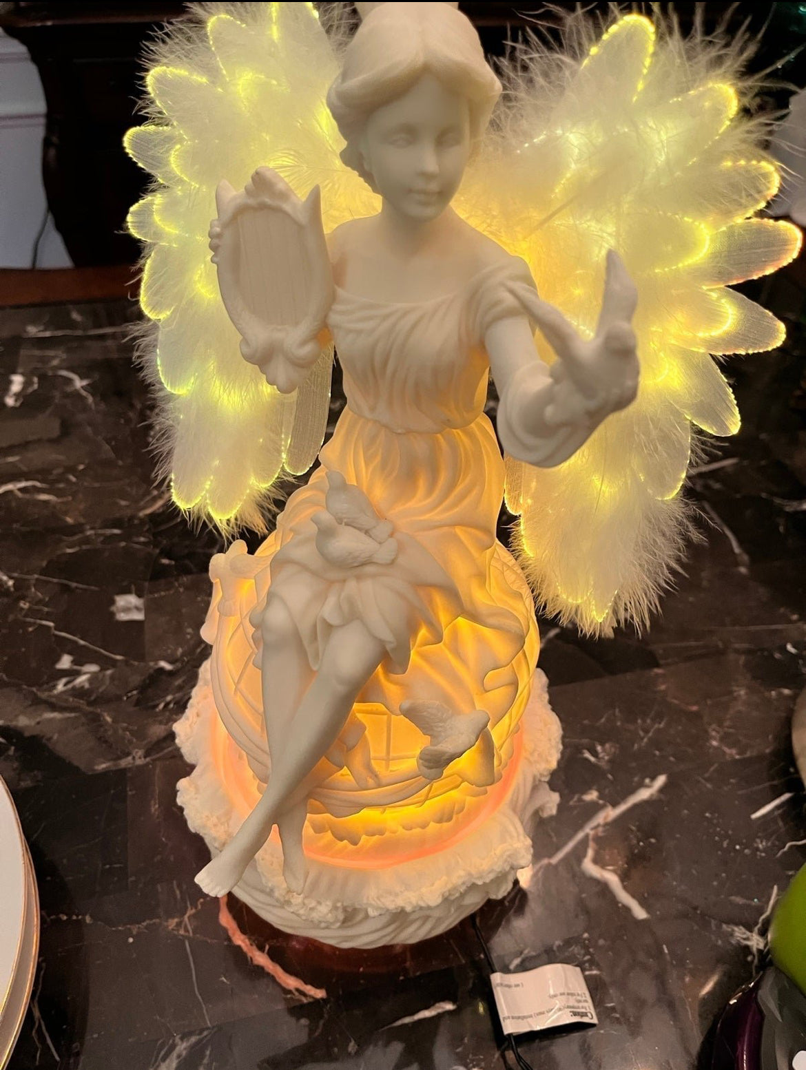 Fiber Optic Rotating Angel Sitting On Globe "A Season Of Peace" By Mark Klans