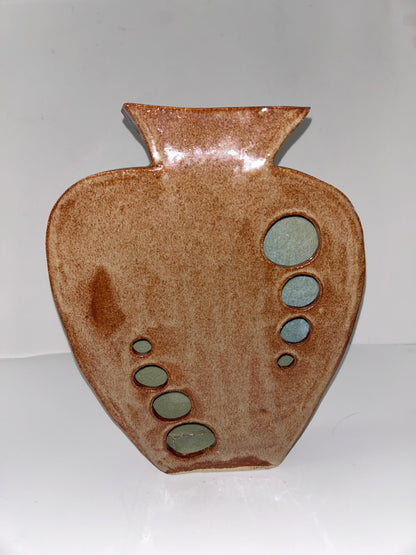 Earthy Ceramic Vase with Circular Cutouts