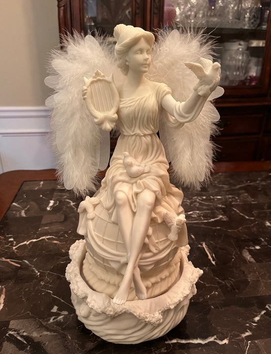 Fiber Optic Rotating Angel Sitting On Globe "A Season Of Peace" By Mark Klans