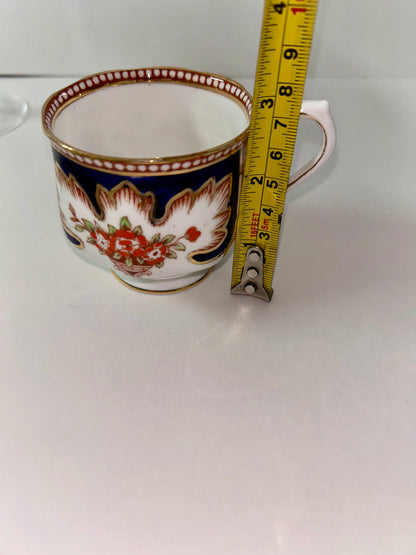 Exquisite Royal Albert "Royalty" Bone China Teacup and Saucer - Cobalt Blue & Orange Floral