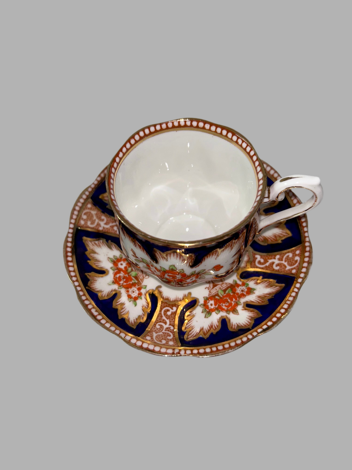 Exquisite Royal Albert "Royalty" Bone China Teacup and Saucer - Cobalt Blue & Orange Floral